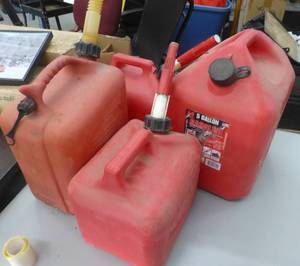 lot 190 image: Four gas jugs, 5 gallon to one