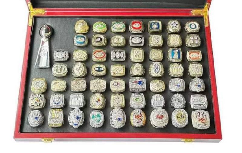 lot 2A image: WOW Brand New NFL Football Super Bowl Championship Ring Set, 57 Rings in Beautiful Display Case with Lombardi Trophy Packers Chiefs Raiders Patriots 49ers Brady Favre Namath Montana Mahomes O