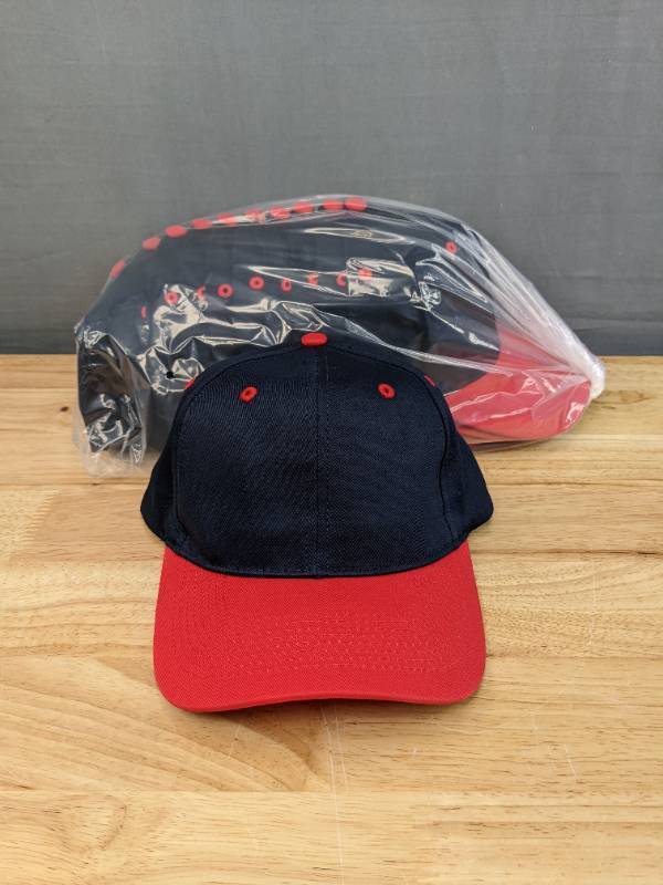 lot 53B image: 60 Brand New Advantage Series Ltd. Navy Blue and Red Hats OSFM A