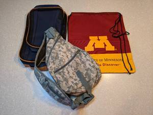 lot 419 image: New U of M Back Pack Camo Crossbody Bag With Zippered Pouches P
