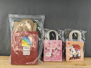 lot 149 image: Collection of New Paper Gift Bags in Various Sizes and Styles, Including South Korean Bands Twice & Ateez B