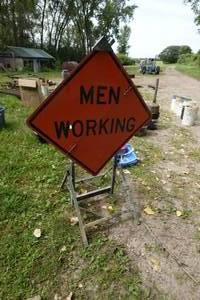 lot 280 image: Men Working Temporary Road Sign with Stand