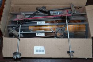 lot 211 image: Automotive Battery Hold Downs