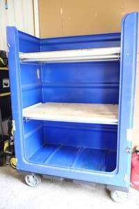 lot 9 image: Portable Blue Poly Rolling Truck Cart-By Diversified Plastics, Inc.