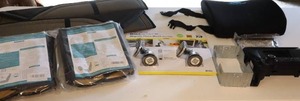 lot 83 image: Auto Seat Covers - Car Radio AM-FM - Magnetic Phone Mount Etc