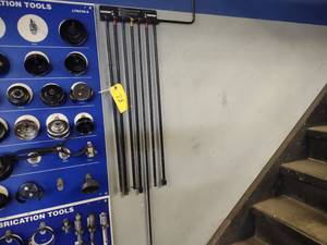 lot 73 image: Spare Tire Removal Tools...