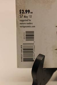 lot 134 image: Scalped Comic Issue 57 and Resident Evil Operation Raccoon City Promo