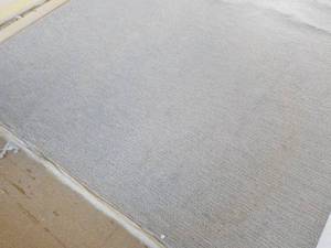 lot 1 image: 12 ft. Carpeting new length unknown...