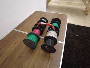lot 40 image: Lot of Assorted Electrical Wire Spools with Dispenser Rack