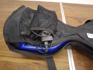 lot 161 image: Blue Hoverboard with Carrying Case and Charger