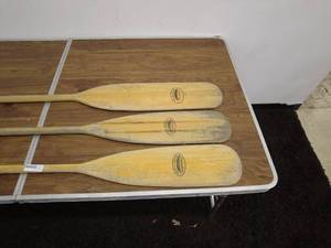 lot 188 image: Set of 3 Feather Brand Wooden Canoe Paddles by Caviness Woodworking Co.