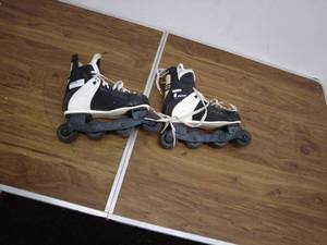 lot 147 image: Pair of Used CCM Roller Hockey Skates