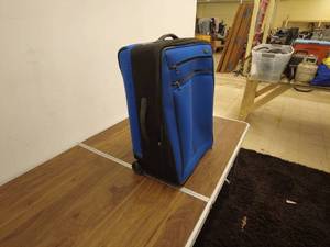 lot 152 image: Blue Rolling Suitcase