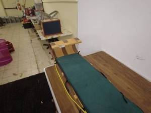 lot 24 image: L.L. Bean Wooden Toboggan with Green Cushion