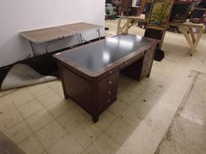 lot 29 image: Large Wooden Desk with Glass Top and Multiple Drawers