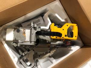 lot 3 image: DEWALT 20V MAX Cordless 7-14 in. Sliding Miter Saw with (1) 20V Battery 4.0Ah Customer Returns See Pictures