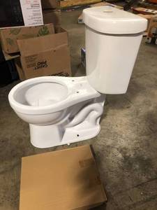 lot 15 image: Delta Toilet Customer Returns See Pictures