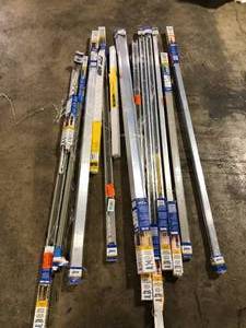lot 16 image: Lot of Assorted Sliding Bypass Track and Hardware Set for 2 Bypass Doors and Pocket Door Track and Hardware Set Various Models and Conditions Customer Returns See Pictures