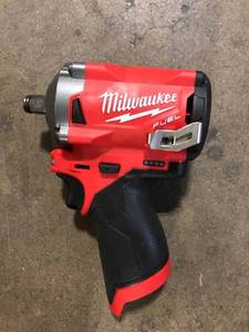 lot 30 image: Milwaukee M12 FUEL 12V Lithium-Ion Brushless Cordless Stubby 12 in. Impact Wrench (Tool-Only) Customer Returns See Pictures
