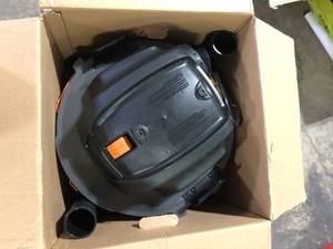 lot 46 image: RIDGID 12 Gallon 5.0 Peak HP NXT Shop Vac Wet Dry Vacuum with General Debris Filter, Locking Hose and Accessory Attachments Customer Returns See Pictures
