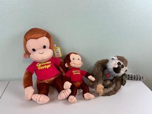 lot 156 image: Curious George Lot Plus One