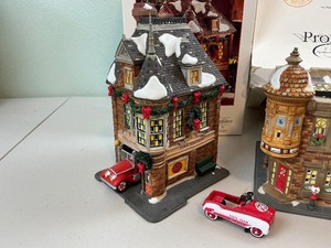 lot 196 image: Dept. 56 State Farm Village Christmas Lot