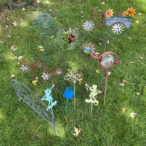 lot 81 image: Garden Yard Art Lot