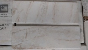 lot 27 image: Lot of 17 boxes of Daltile Ceramic Wall Tiles in White with Brown Veining