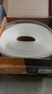 lot 37 image: 2 Rolls of TR Rubber Wall Base - 4 x 120 x 18 - Almond Color