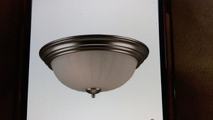 lot 64 image: Craftmade 15 Step Pan Melon Flushmount Light Fixture - Brushed Nickel