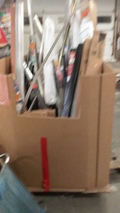 lot 129 image: Lot of Garage Door Seals and Thresholds with Storage Bins