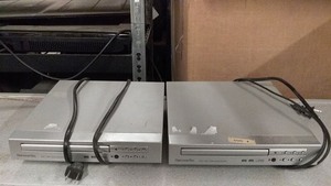 lot 140 image: Lot of 2 Used DVD Players by Harmonix with Connectivity Cables