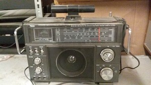 lot 145 image: Vintage Portable Radio with Analog Tuner and Speaker