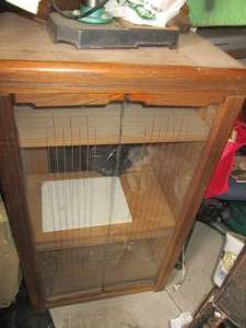 lot 251 image: Wood framed glass front stereo cabi...