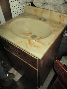 lot 167 image: Small bathroom cabinet with sink