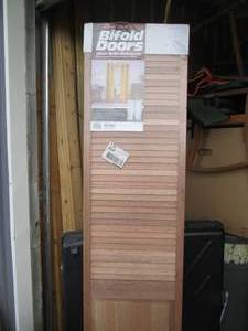lot 168 image: Wood bi-fold door
