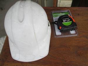 lot 175 image: Hard hat and tape measure