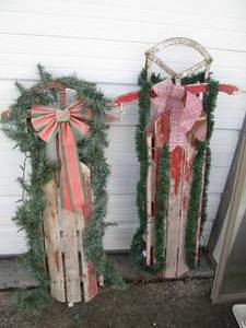 lot 93 image: Pair of Vintage toboggan sleds hugg...