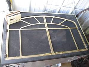 lot 99 image: Black and Brass tone 2-door gas fir...
