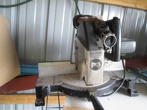 lot 106 image: Black and Decker Power Mitre Saw...