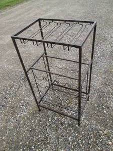 lot 107 image: Freestanding metal framed wine rack...