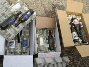 lot 129 image: (3) box lot of decorative wine bott...