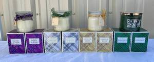 lot 74 image: Candle Collection - 8 Slatkin & Co. 9.5 oz candles, 1 Slatkin & Co. 14.5 oz and 3 CandleImpressions Candles with Timers