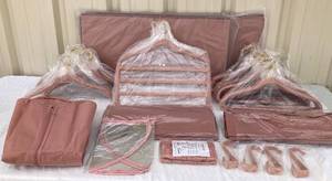 lot 61 image: Huggable Hangers Pink Closet Organization Systems- TWO SETS