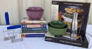lot 58 image: Kitchen Bundle -ALL New in Boxes- Cookbooks , Mixing Bowls, 3 Tier Oven Companion, Pepper Mill, Pastry Pro and Masher