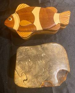 lot 132 image: Buckeye Burl Wood Puzzle Jewelry Box and Wooden Clownfish Puzzle Box