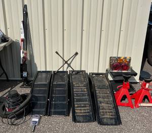 lot 92 image: Car Care Collection - Ramps, Pair of 6 Ton Jacks, Hi-Lift Jack, Trailer Light Kit, Ultra Tow Receiver Lock