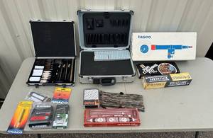 lot 104 image: Gun Care Collection - Gun Cleaning Kits, Gun Case, Barska Riflescope, Tasco Scope, Holster, Gun Lock
