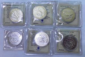 lot 134 image: Attack on Pearl Harbor Collectible Five $5 Coins in Cases and Confederate States of America Half Dollar