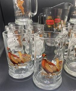 lot 79 image: Set of 14 Schmidt Collector Series Beer Mugs and Glass Pitcher - 8 Geese, 4 Eagle and 2 Pheasant Mugs